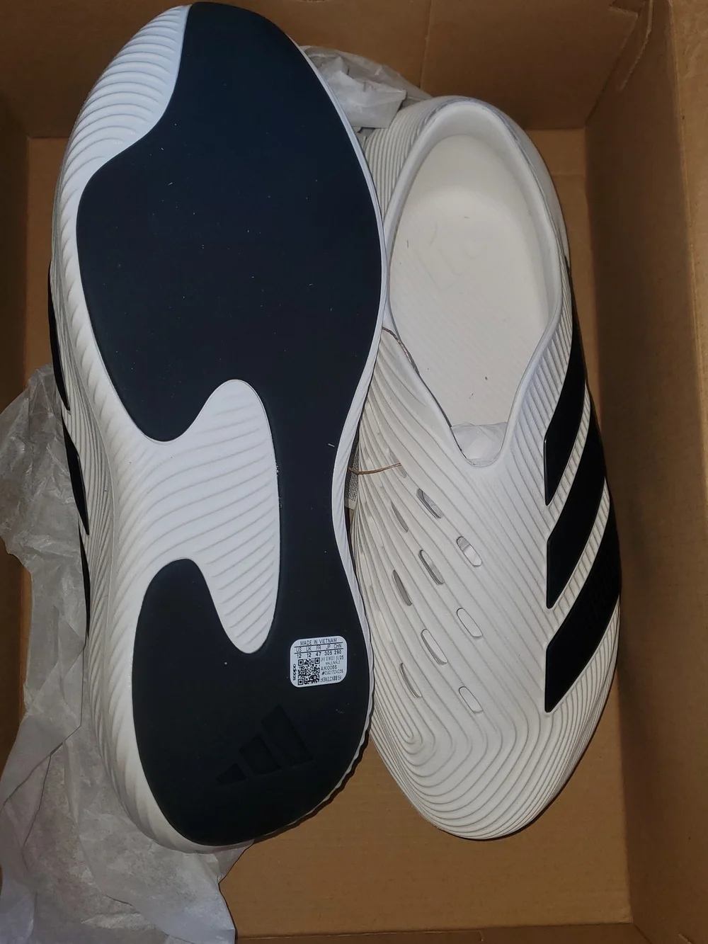 Adidas Men's White Slip-On Athletic Shoes with Black Accents